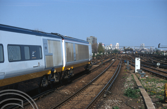 05554. 3223 running ECS to Waterloo. Clapham Jn. 21.4.1996
