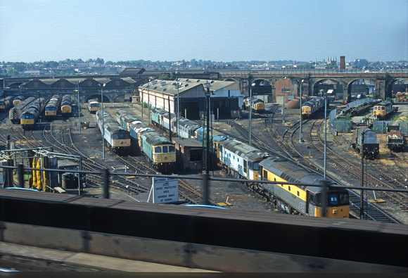 06732. View of the depot from a passing train. Stewarts Lane. June 97