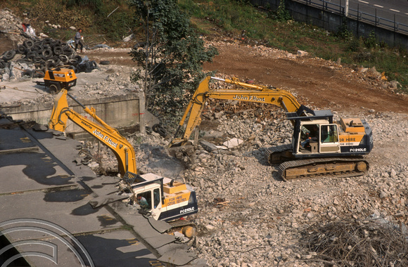 S0073. Demolition of old multi-storey car park. Lefevere Estate. Bow. East London September 1994