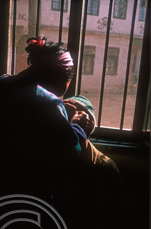 T6946. Plucking a man's eyebrows. Darjeeling. West Bengal. India. April.1998.