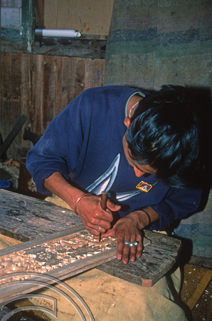 T6958. Wood carver at the Tibetan refugee centre. Darjeeling. West Bengal. India. April.1998.