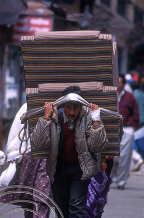 T6978. Porter with Furniture. Darjeeling. West Bengal. India. April.1998.