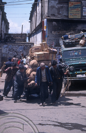 T6980. Porters with heavy cart. Darjeeling. West Bengal. India. April.1998.