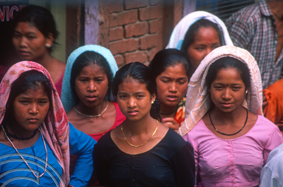 T7026. Local girls watching film making. Kathmandu. Nepal. April.1998.