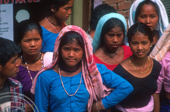 T7025. Local girls watching film making. Kathmandu. Nepal. April.1998.