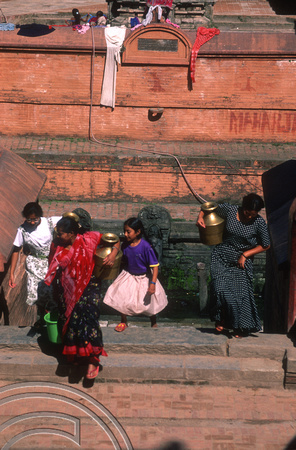 T7046. Women collecting water. Patan. Nepal. April.1998.