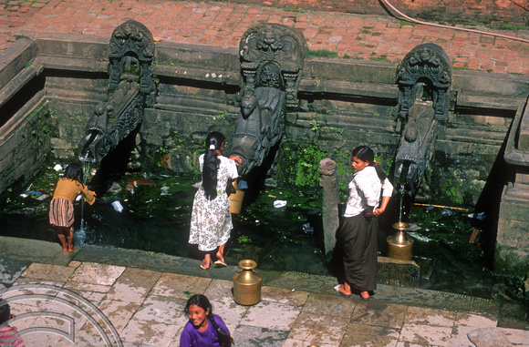 T7044. Women collecting water. Patan. Nepal. April.1998.