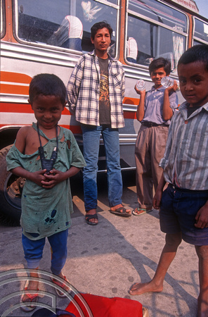 T7055. Beggar children at the bus station. Kathmandu. Nepal. April.1998.