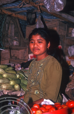T7057. Girl on a market stall. Gorkha. Nepal. April.1998.