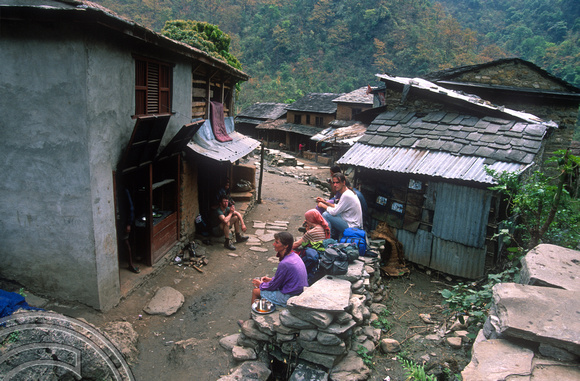 T7087. Stopping for lunch in a village. Gorkha district. Nepal. April.1998.