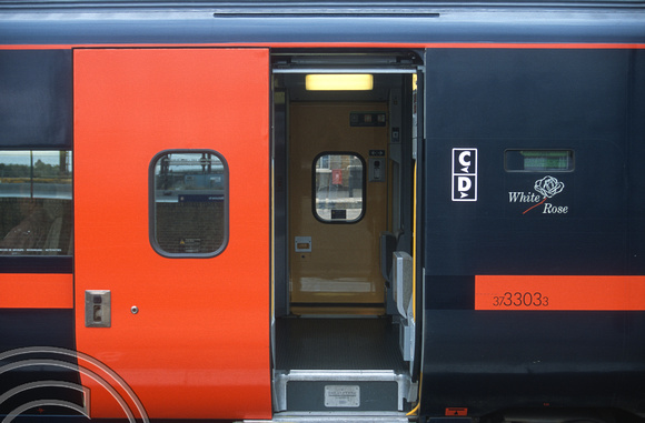 12952. Doors on a GNER Eurostar in a different colour to match disability legislation. Kings Cross. 25.08.2003