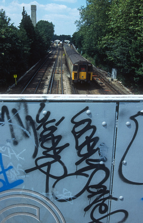 10817. Graffiti on a footbridge. Shortlands. 15.07.2002