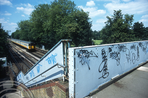 10813. Graffiti on a footbridge. Shortlands. 15.07.2002