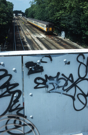 10816. Graffiti on a footbridge. Shortlands. 15.07.2002