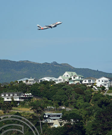 DG315836. Plane taking off from the airport. Wellington. North Island. New Zealand. 9.1.19