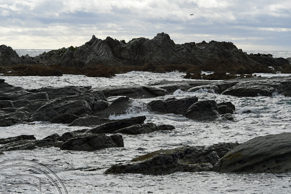 DG316223. Rocks and sea. Kaikoura. New Zealand. 14.1.19
