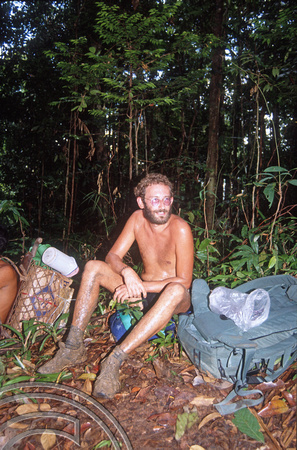 T03745. Me resting jungle trekking. Siberut. Mentawai Islands. Indonesia. June 1992