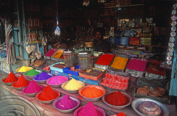 T03101. Coloured powders on sale. Deveraja market. Mysore. Karnataka. India. December 1991.