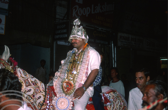 T02872. Indian wedding procession. Groom. Paharganj. Delhi. India. 16th October 1991