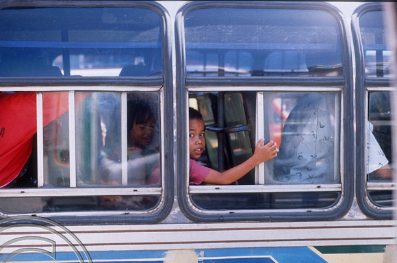 T03682. Young boy on a bus. Bukittinggi. West Sumatra. Indonesia.  10th June 1992