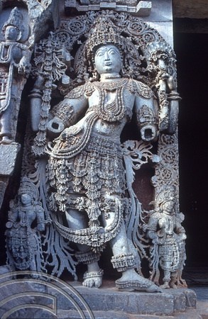 T03119. Statue on the Hoysaleswara temple. Halebid. Karnataka. India. December 1991