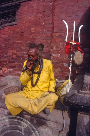 T03290. Sadhu in the Square. Bakhtapur. Kathmandu Valley. Nepal. 13th March 1992