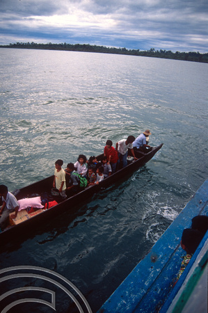 T03729. Arriving in Siberut by transfer to small boats. Padang. West Sumatra. Indonesia.  16th June 1992