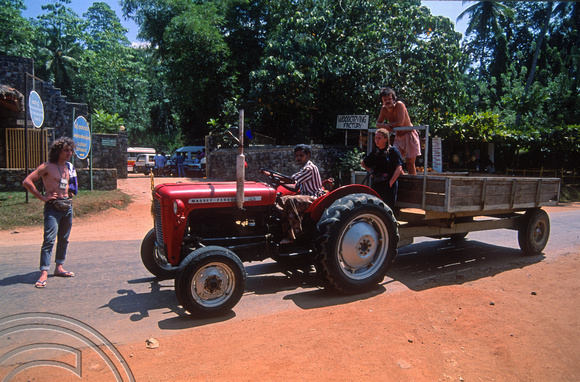 T03159. Hitching a lift to the elephant orphanage. Pinnewala. Sri Lanka. February 1992.