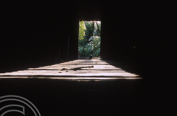 T03810. Bamboo floor in an uma. Mentawai Islands. Indonesia. 21st June 1992
