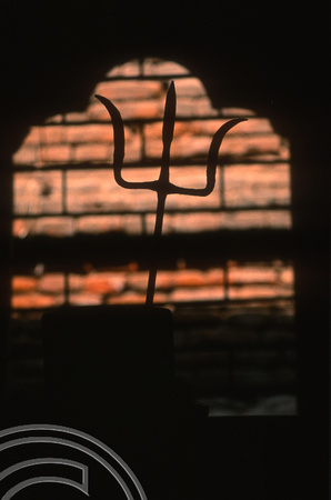 T03379. Shiva trident in a shrine. Kathmandu. Nepal. March 1992