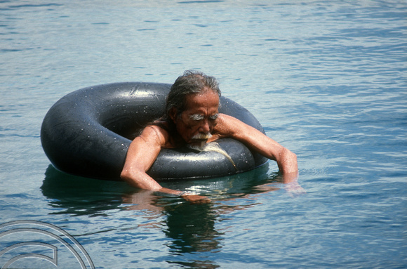 T03861. Old man in the lake. Maninjau. West Sumatra. Indonesia. 25th June 1992