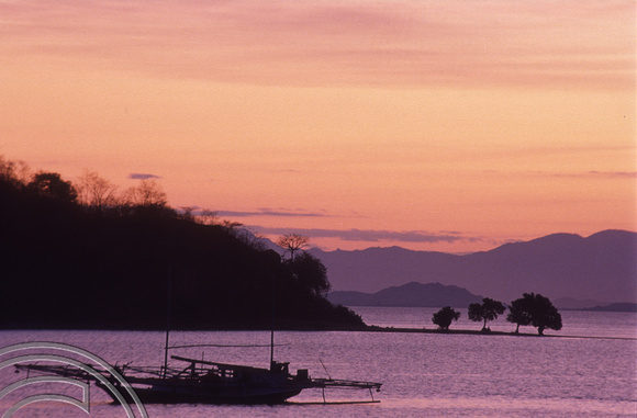 T04053. Sunset over the harbour. Labuanbajo. Flores. Indonesia. 5th September 1992