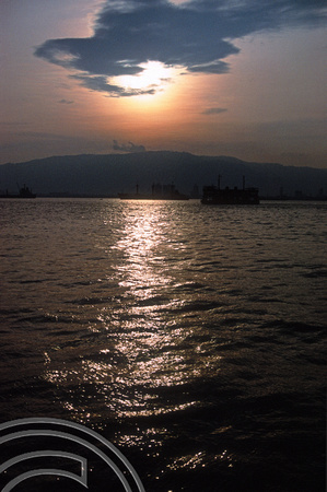 T03483. Penang ferry at Sunset. Penang island. Malaysia.  30th April 1992