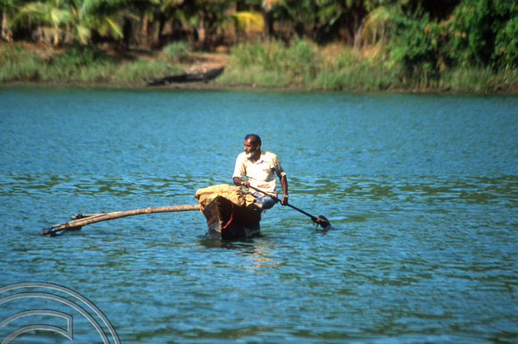 T03073. Canoeing across the Terekol river. Pernem. Goa. India. December 1991.