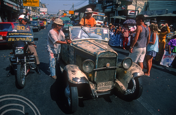 T03397. Vintage car. Parade. Khao San Rd. Bangkok. Thailand.  12th April 1992
