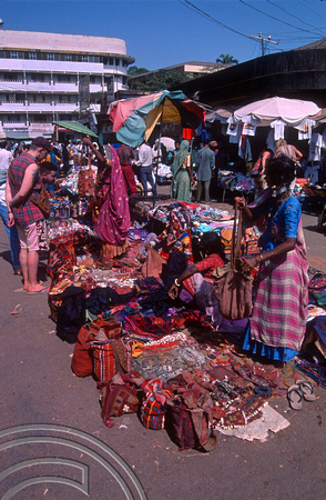 T03140. Tribal woman selling bags. Mapusa. Goa. India. January 1992.