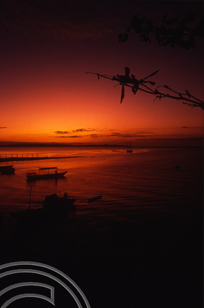 T04132. Sunset over the harbour. Semau Island. Timor. Indonesia. 14th September 1992