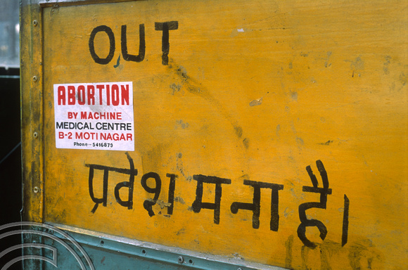 T02865. Abortion poster on the side of a bus. Delhi. India. October 1991
