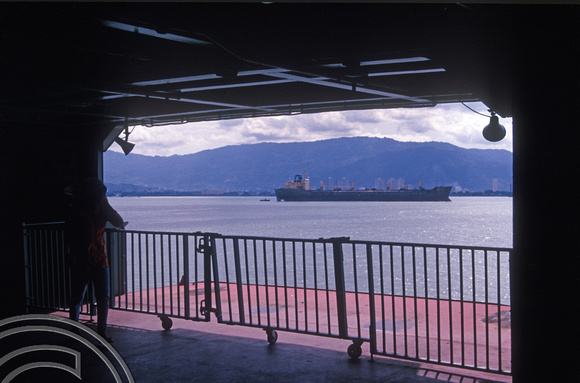 T03558. Shipping seen from the ferry to Penang. Malaysia. 15th May 1992