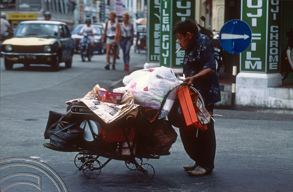 T03510. Homeless person. Lebuh Chulia. Georgetown. Penang island. Malaysia. 5th May 1992