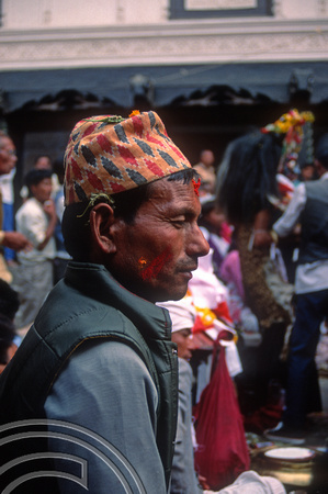 T03369. Man at a festival in Durbar Square. Kathmandu. Nepal. March 1992