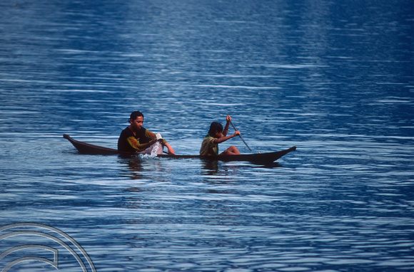 T03661. Local lads canoeing. Lake Maninjau. West Sumatra. Indonesia.  8th June 1992