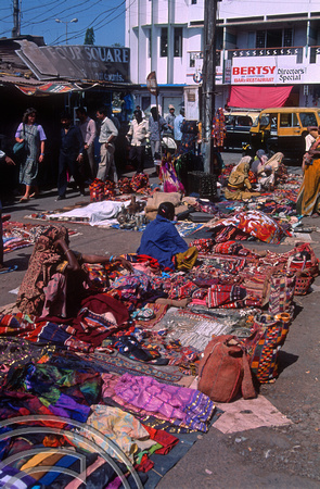 T03141. Tribal woman selling bags. Mapusa. Goa. India. January 1992.