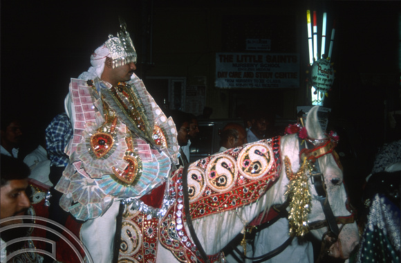 T02876. Indian wedding procession. Groom. Paharganj. Delhi. India. 16th October 1991