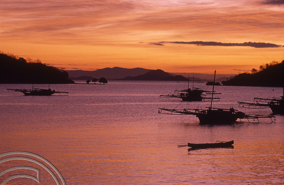 T04054. Sunset over the harbour. Labuanbajo. Flores. Indonesia. 5th September 1992