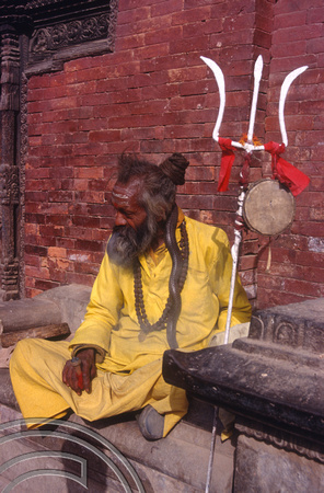 T03291. Sadhu in the Square. Bakhtapur. Kathmandu Valley. Nepal. 13th March 1992