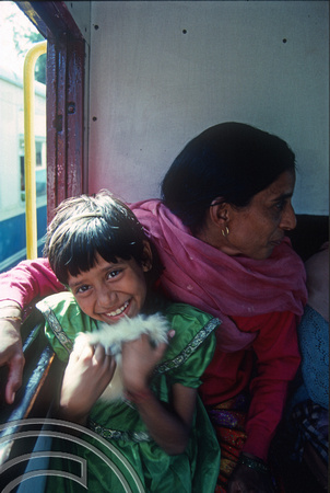 T02918. Mother and daughter on the Shimla - Kalka train. Himachal Pradesh. India. 22nd October 1991