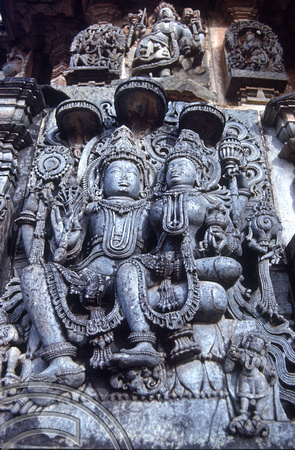 T03120. Statue on the Hoysaleswara temple. Halebid. Karnataka. India. December 1991