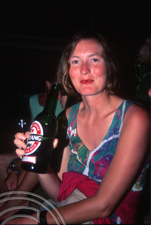 T03651. Laura with a beer. Lake Maninjau. West Sumatra. Indonesia.  June 1992