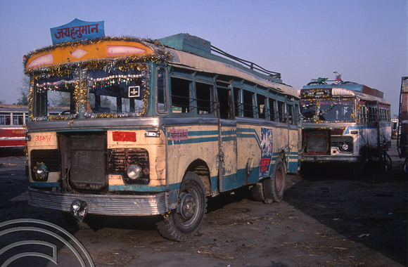 T03261. Battered buses. Janakpur. The Terai. Nepal. 9th March 1992